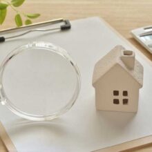 Tax Assessment Appeals Magnifying glass and house